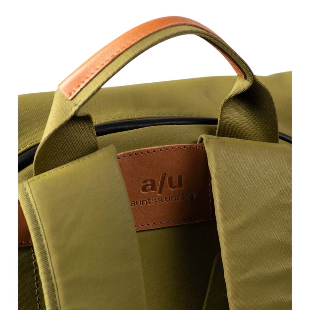 Lieblingstasche Yokohama olive green backpack with brown leather handle and embossed aunts & uncles logo patch