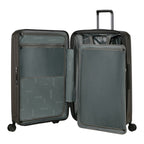 Lieblingstasche 2WANDER spinner suitcase interior with grey fabric lining, mesh pockets, and zippered compartments.