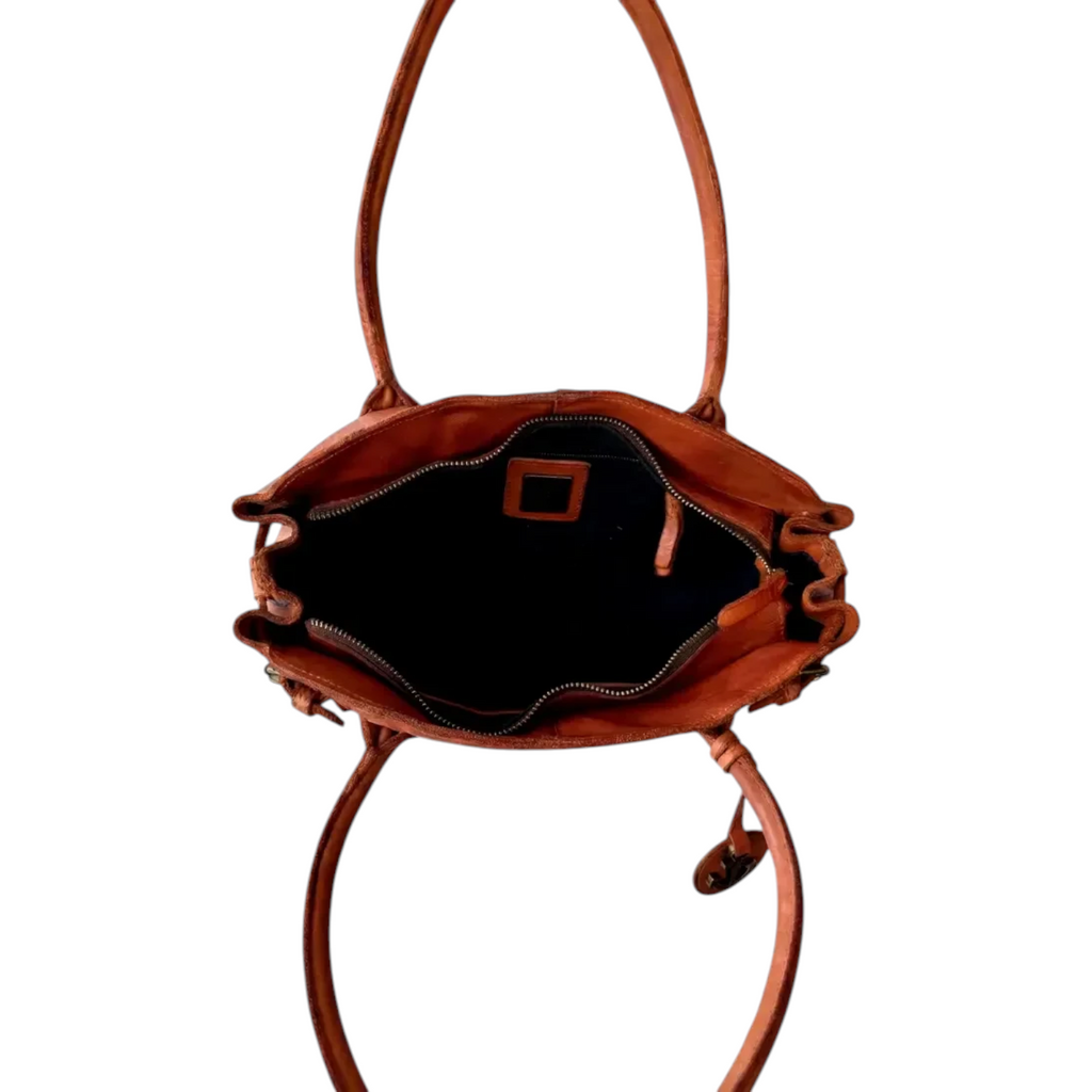 Lieblingstasche Adriella brown leather handbag viewed from above showing the spacious interior and zipper closure