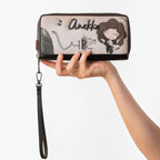 Lieblingstasche Anekke wallet featuring a whimsical girl illustration, musical notes, and a detachable wrist strap.