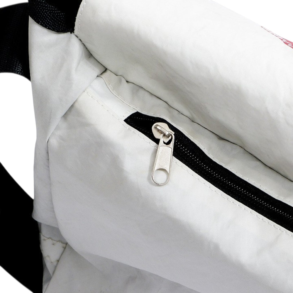 Lieblingstasche Barkasse Mini messenger bag made from white recycled sailcloth with a black zipper detail.