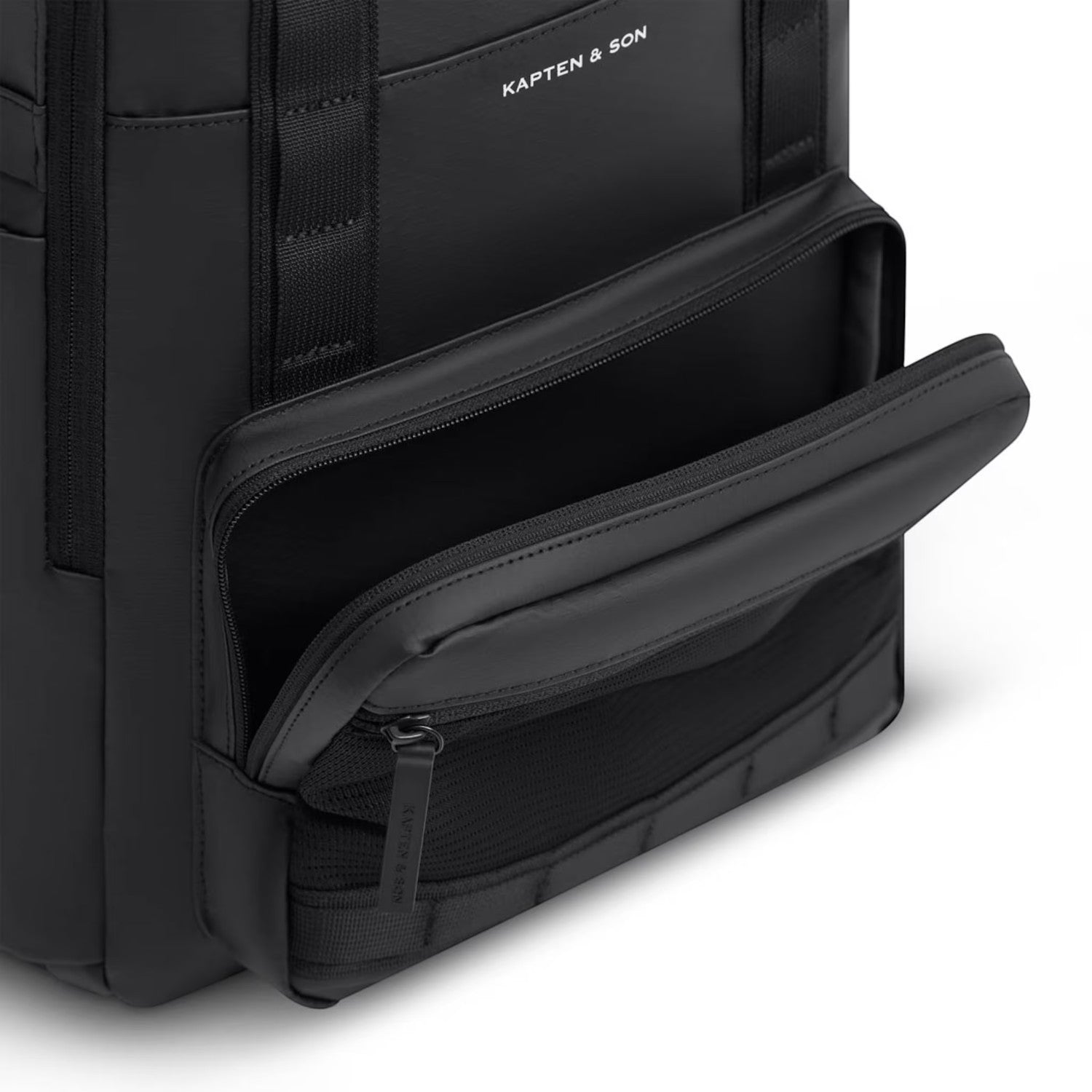 Lieblingstasche Bergen Ultra black backpack with an open front zippered pocket showing mesh interior compartments