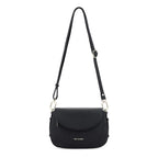Lieblingstasche Big Sister black pebbled leather crossbody bag with adjustable strap and gold hardware