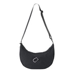 Lieblingstasche black crescent-shaped sling bag with an adjustable strap and silver carabiner detail