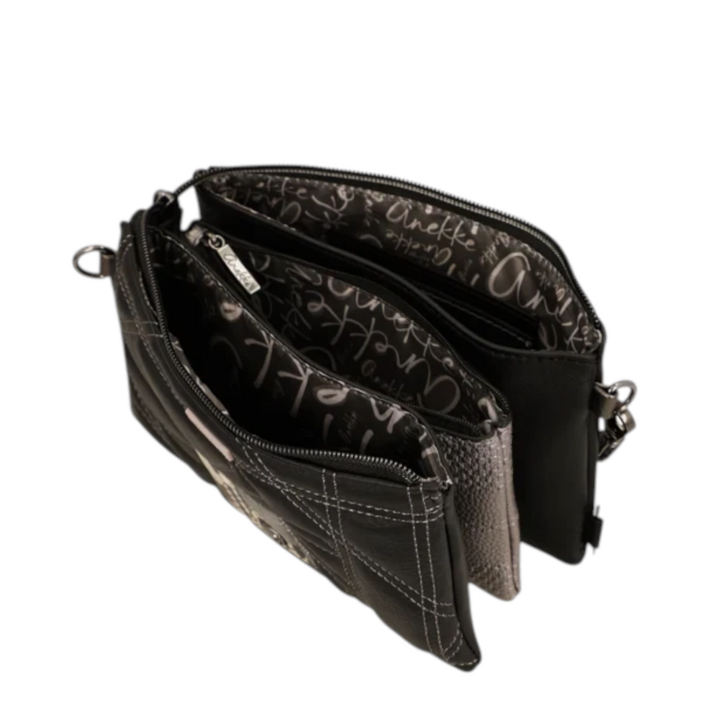 Lieblingstasche black cross-body bag with multiple zippered compartments and patterned interior lining
