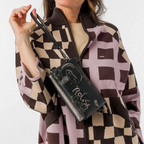 Lieblingstasche black leather cross-body bag with metallic accents and Relish the moment graphic print