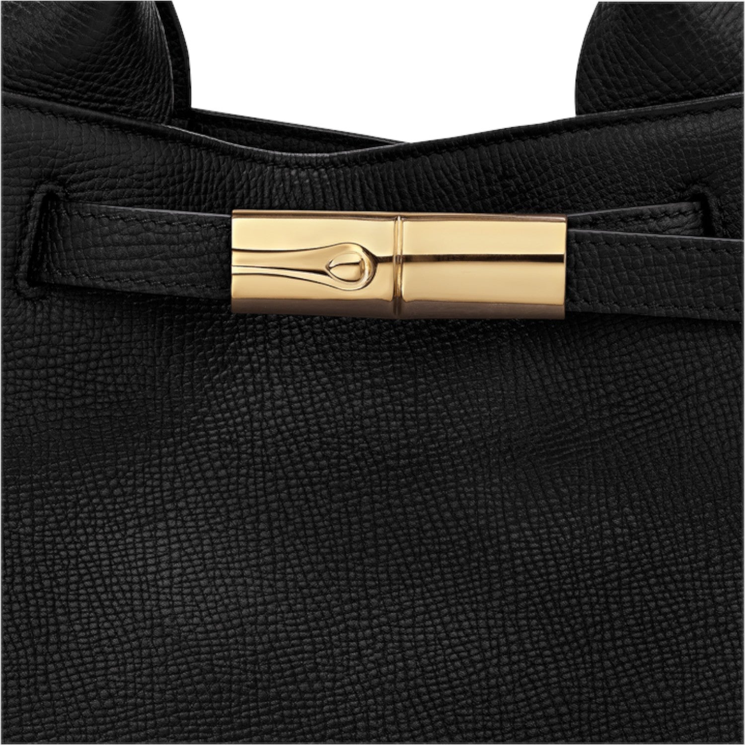 Lieblingstasche Le Smart Flow black leather handbag featuring a polished gold-tone metal clasp detail