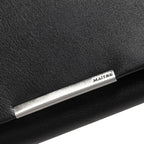 Lieblingstasche black leather purse with silver metal accent and embossed logo.