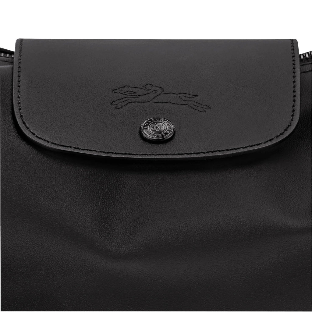 Lieblingstasche black leather shoulder bag with embossed horse logo and snap closure
