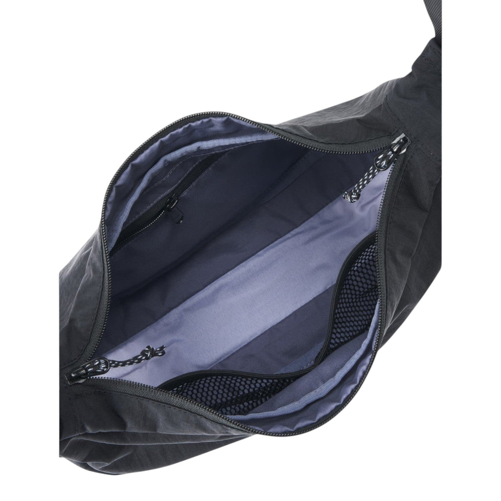 Lieblingstasche black nylon sling bag interior view with zipper pocket and mesh compartment