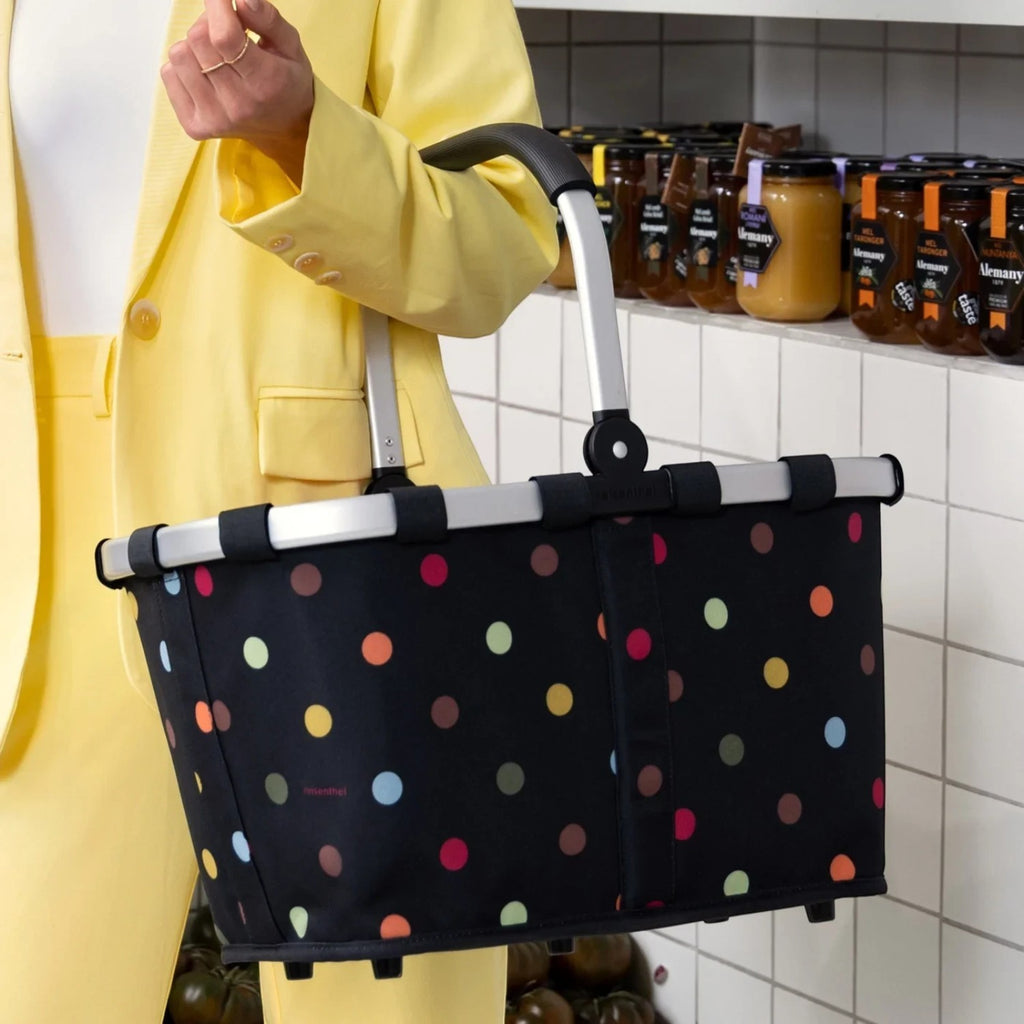 Lieblingstasche black carrybag with colourful polka dots, featuring a sturdy aluminium frame and ergonomic handle.