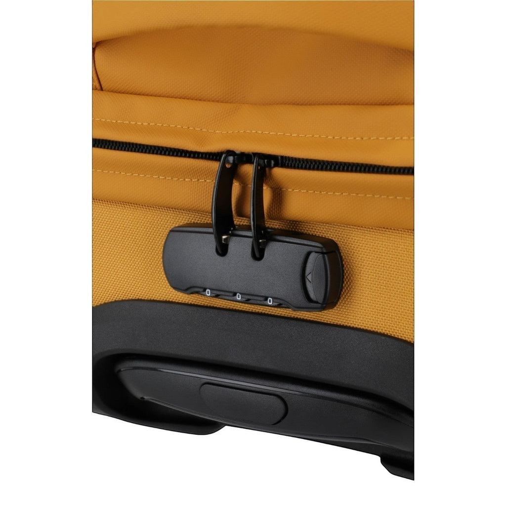 Lieblingstasche BOLONIA L travel bag in mustard yellow fabric with black combination lock and zipper.