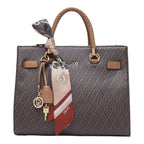 Lieblingstasche Tote M brown monogram handbag with braided handle, gold hardware, and decorative patterned scarf