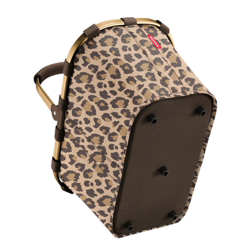 Lieblingstasche Carrybag shopping basket in leopard print with a sturdy gold-tone aluminium handle and brown base.