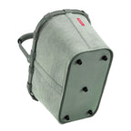 Lieblingstasche Carrybag in sage green with a sturdy aluminium handle and protective feet, shown from below.
