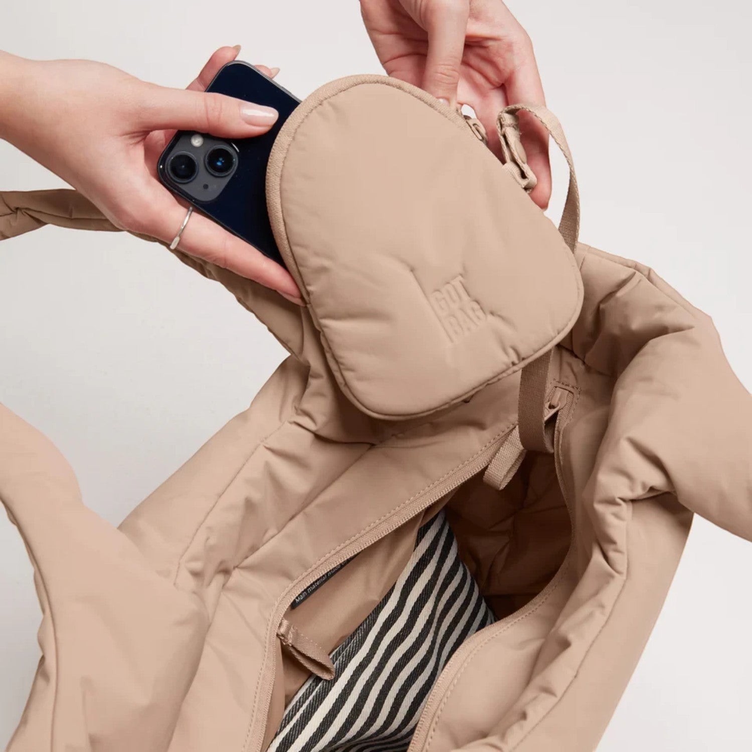 Lieblingstasche Cloud Tote Bag in beige with a detachable pocket bag and internal striped lining