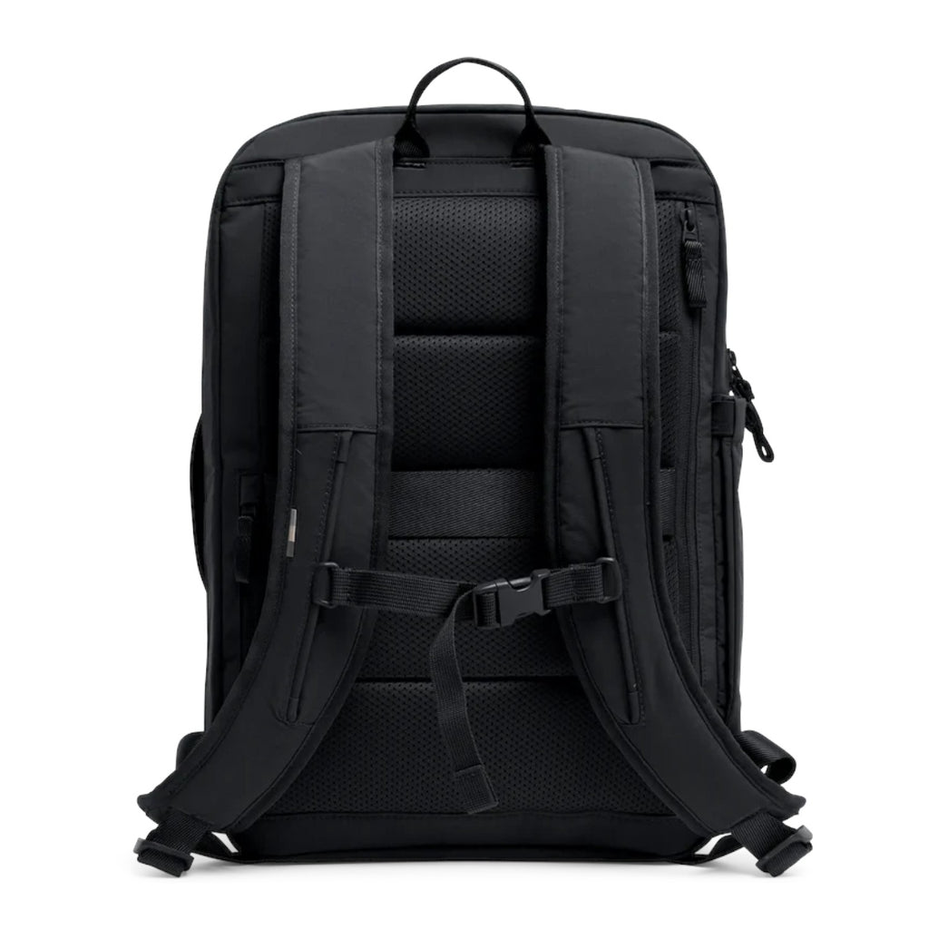 Lieblingstasche Commuter Pack in black featuring padded shoulder straps, breathable mesh back panel, and chest strap.