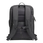 Lieblingstasche Commuter Pack in charcoal grey with padded mesh back panel, adjustable straps, and chest buckle.
