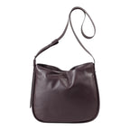Lieblingstasche Coral dark brown leather hobo shoulder bag with adjustable strap on a white background