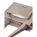 Lieblingstasche Dawn taupe leather handbag with a front zippered pocket and patterned interior lining