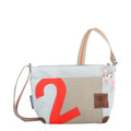 Lieblingstasche Deern Lütt crossbody bag made from recycled white and beige sailcloth with a bold red number two print
