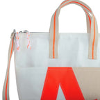 Lieblingstasche Deern Mini white tote bag with neon orange accents, canvas handles, and zipper pulls