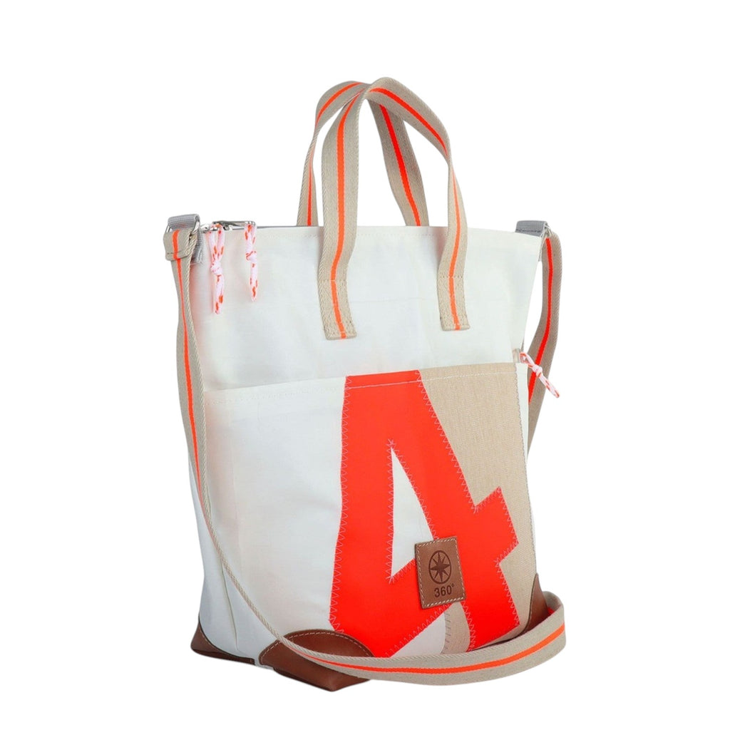 Lieblingstasche Deern Mini white sailcloth tote bag with neon orange letter A, beige trim, and brown leather base.