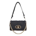 Lieblingstasche Crossbody M bag in dark denim with quilted pattern, faux fur trim, and gold-tone chain strap.