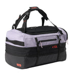 Lieblingstasche Duffel Pack in light purple and black with adjustable straps and expandable 13L capacity feature
