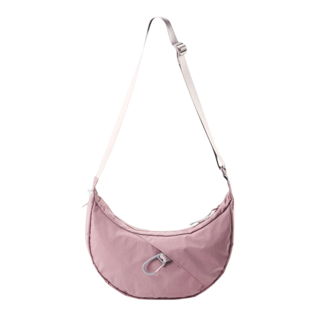 Lieblingstasche dusty pink crescent-shaped nylon sling bag with an adjustable strap and silver carabiner detail