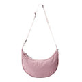 Lieblingstasche dusty pink crescent-shaped sling bag with an adjustable shoulder strap and zipper closure