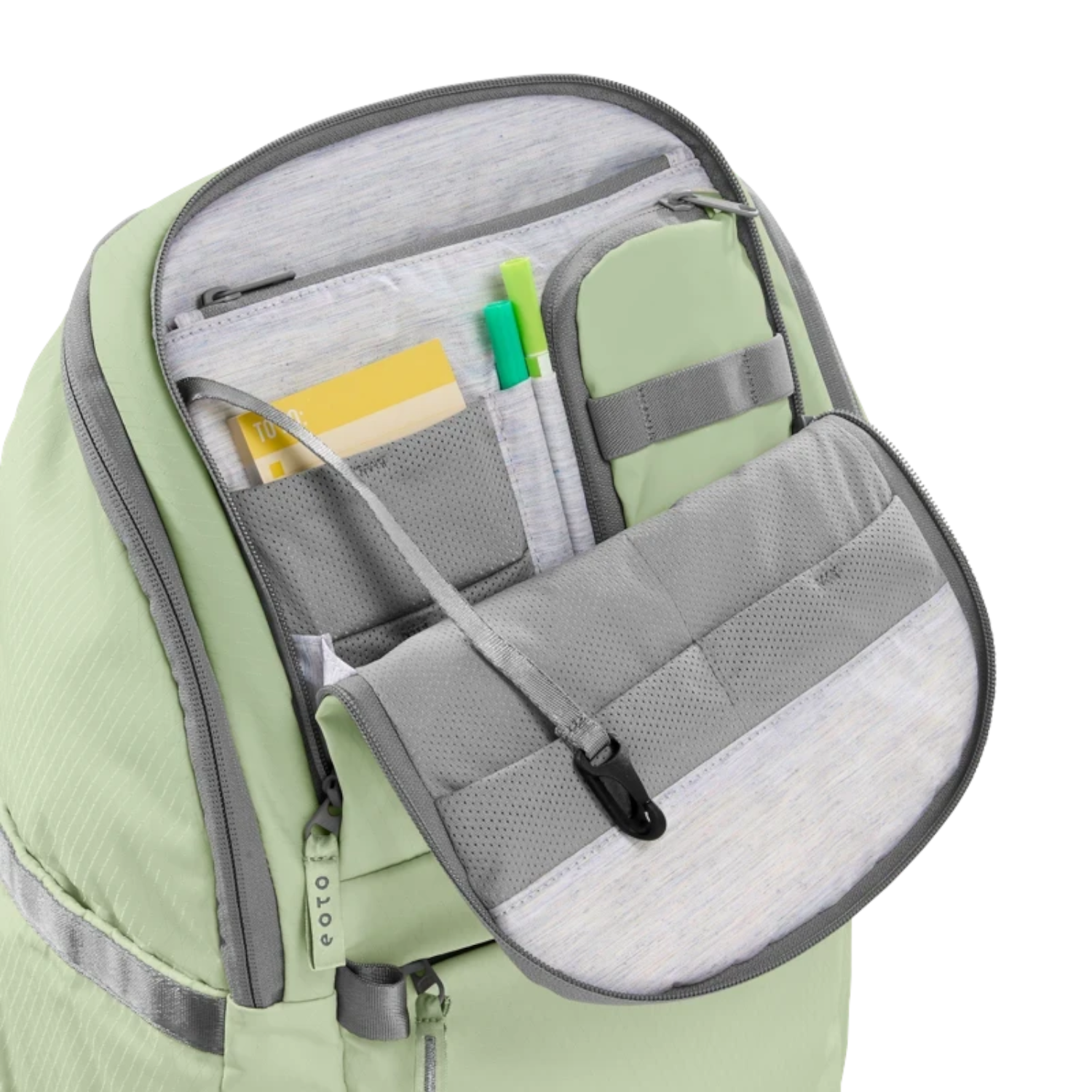 Lieblingstasche eoto Easy27 sage green backpack showing the open front organizer compartment with pockets and key hook