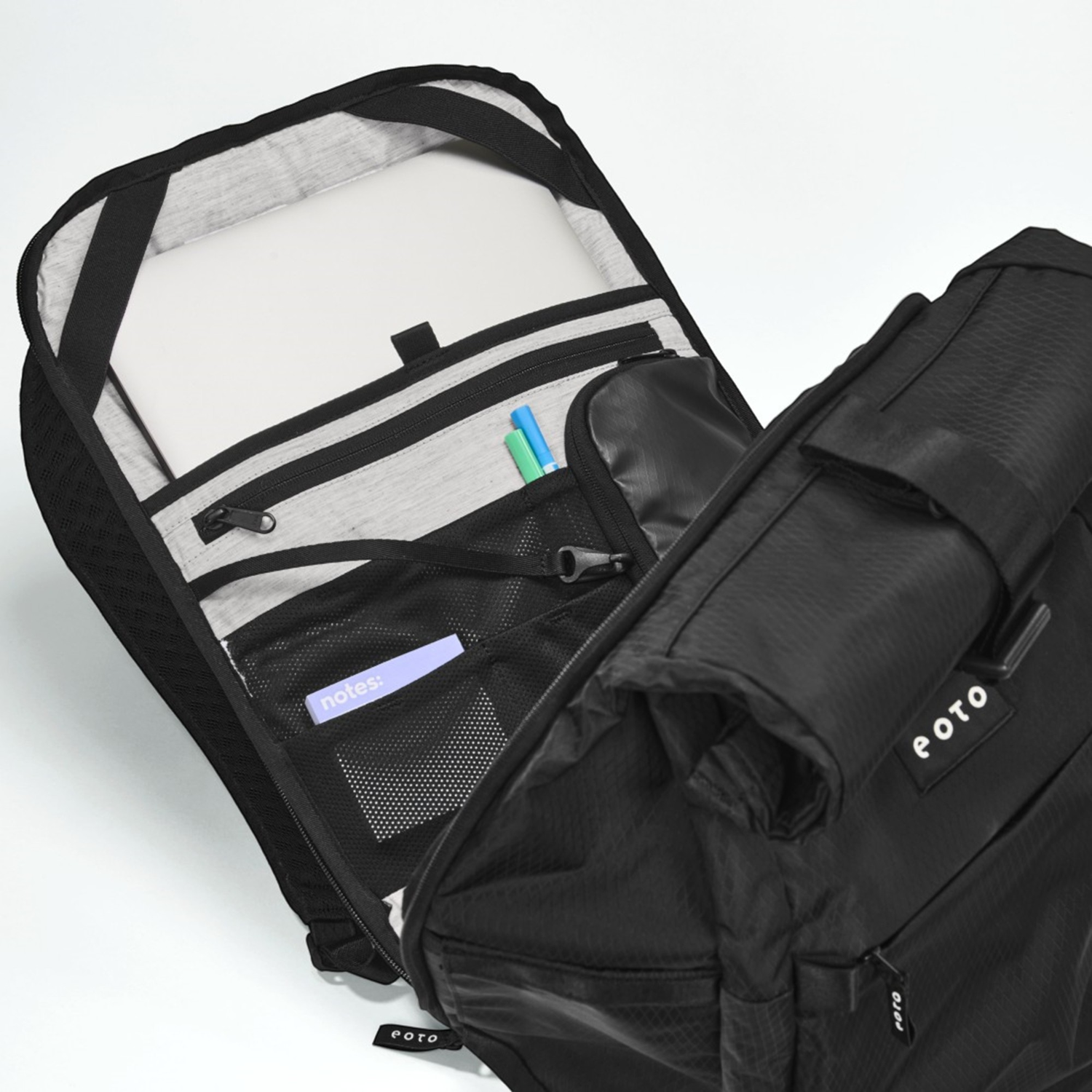 Lieblingstasche eoto Rolly32 black rolltop backpack interior with laptop compartment and organized pockets