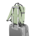 Lieblingstasche eoto Small16 sage green compact daypack attached to a grey rolling suitcase handle