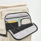 Lieblingstasche eoto Tall41 beige rolltop backpack showing open front organizer pocket with mesh and pen slots