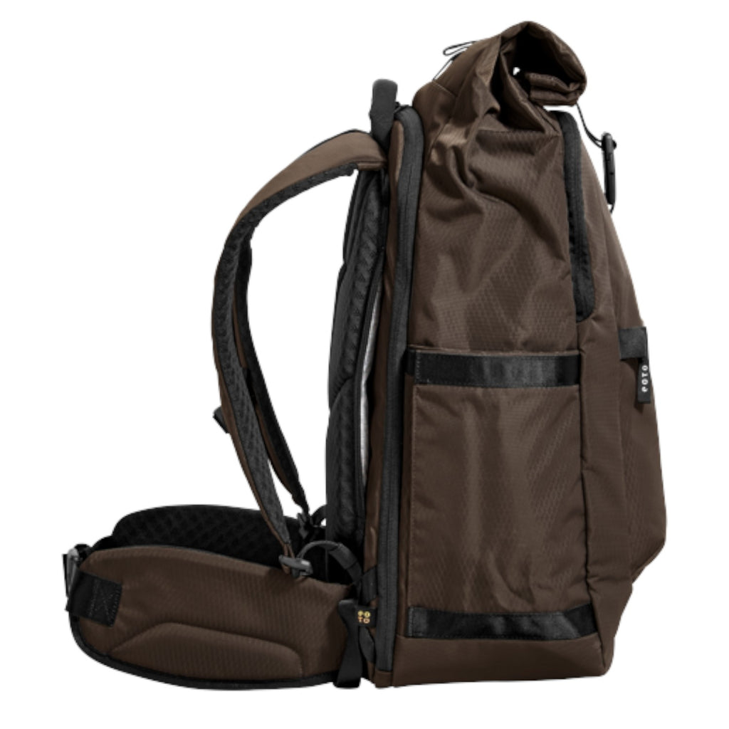 Lieblingstasche eoto Tall41 brown rolltop travel backpack with side view, padded straps, and hip belt.