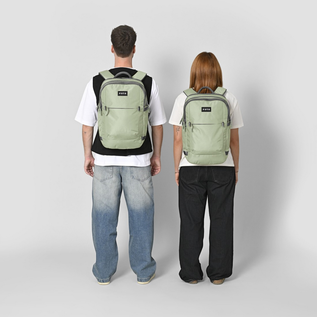 Lieblingstasche eoto Tidy22 sage green business backpack worn by a man and woman for work or university