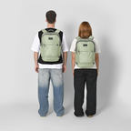 Lieblingstasche eoto Tidy22 sage green business backpack worn by a man and woman for work or university