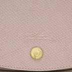 Lieblingstasche Epure S light pink textured leather crossbody bag with embossed horse logo and gold button detail.