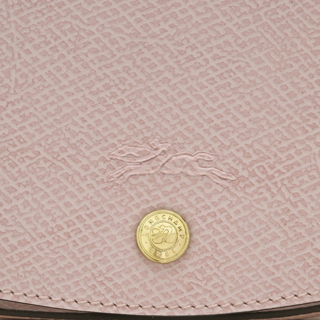 Lieblingstasche Epure S light pink textured leather crossbody bag with embossed horse logo and gold button detail.