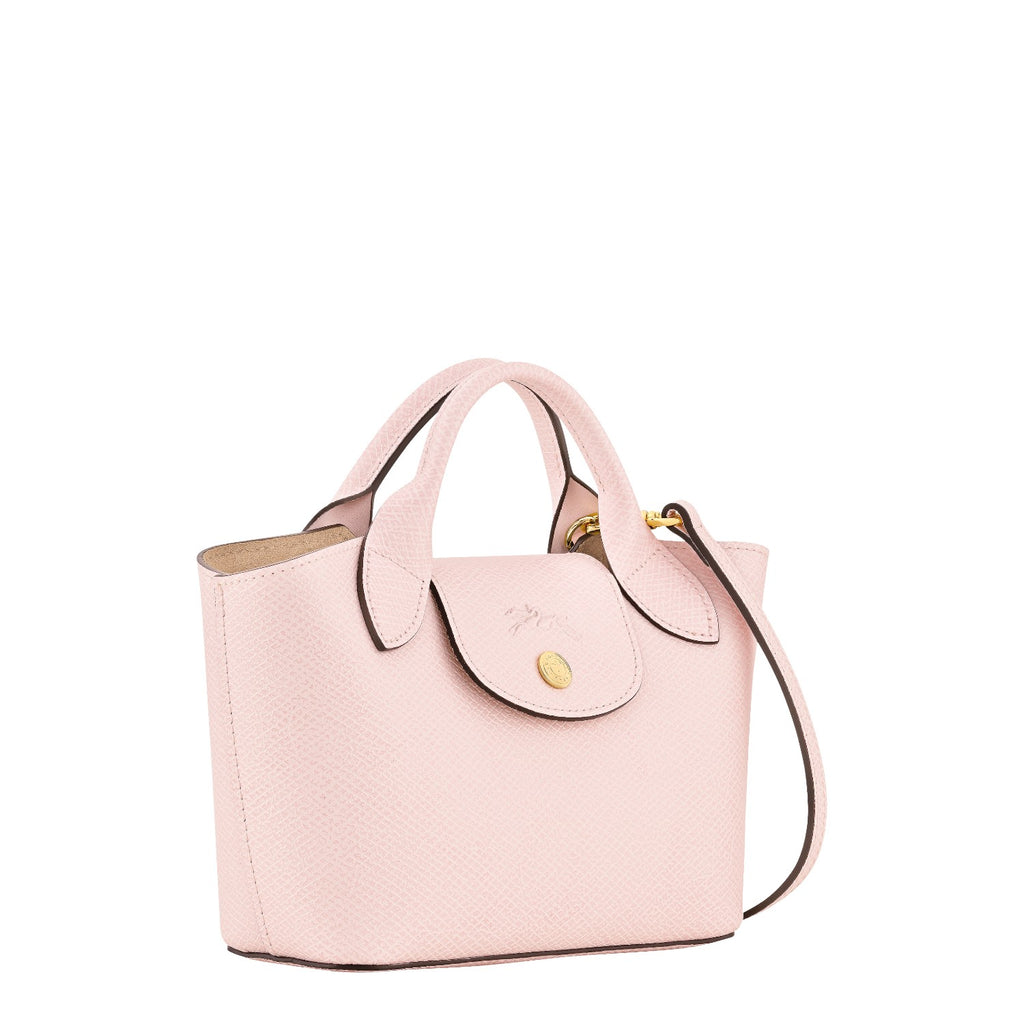 Lieblingstasche Epure Umhängetasche XS, a small pink textured leather handbag with a flap closure and gold hardware.