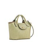 Lieblingstasche Epure XS light green textured leather handbag with gold hardware and embossed logo.