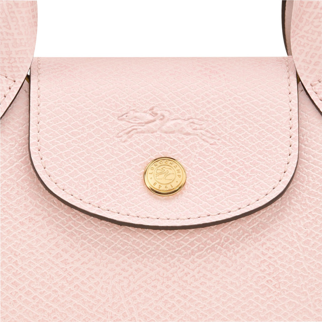 Lieblingstasche Epure XS light pink textured leather crossbody bag with embossed horse logo and gold hardware.