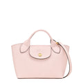 Lieblingstasche Epure XS light pink textured leather handbag with top handle and crossbody strap.