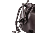 Lieblingstasche Fleur dark brown leather drawstring bucket bag with elegant petal-shaped tassel detail