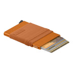 Lieblingstasche Flexwallet in orange with a robust card protector and elastic textile sleeve for cards and cash.