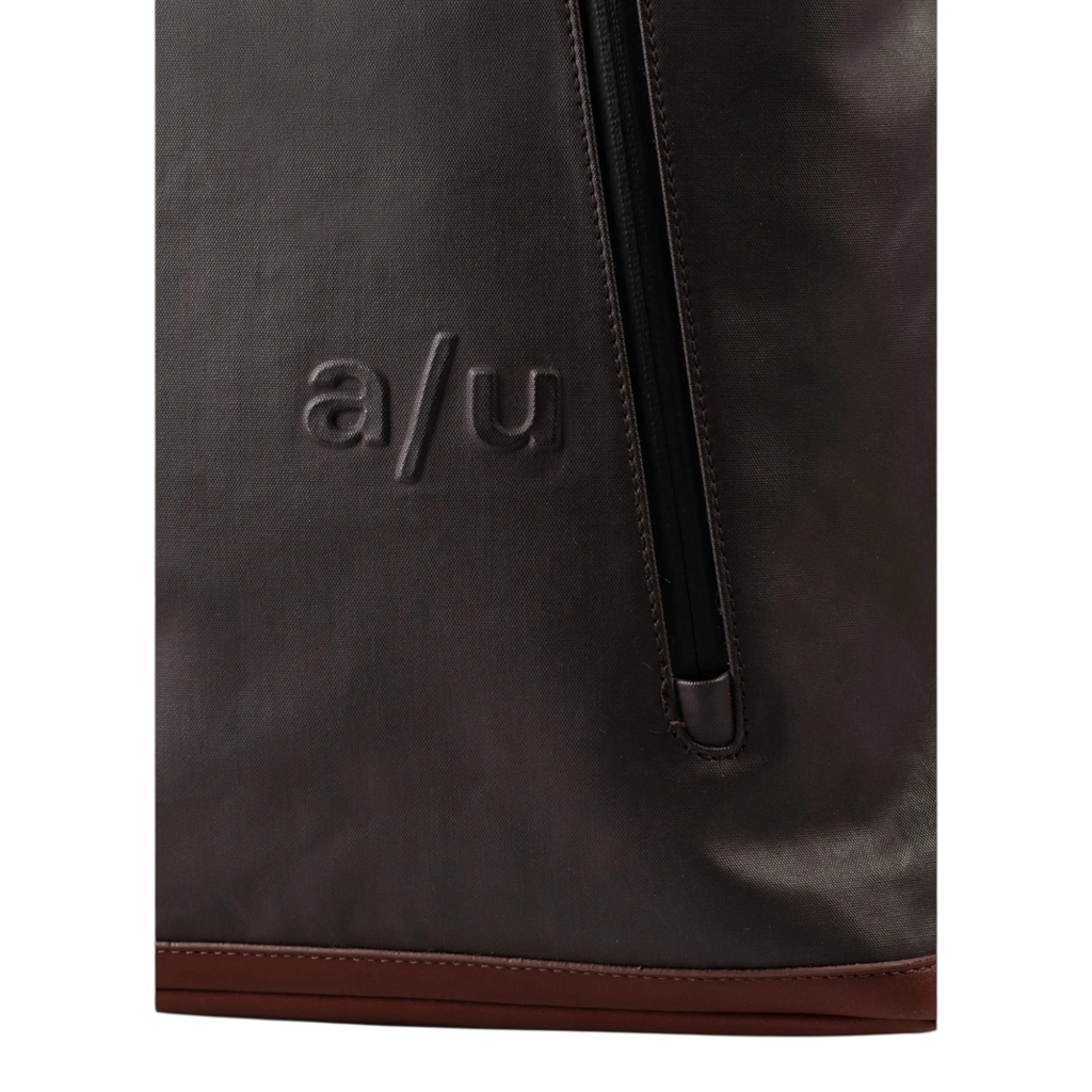 Lieblingstasche a/u by aunts & uncles Fukui backpack in dark brown coated canvas with leather trim and front zipper