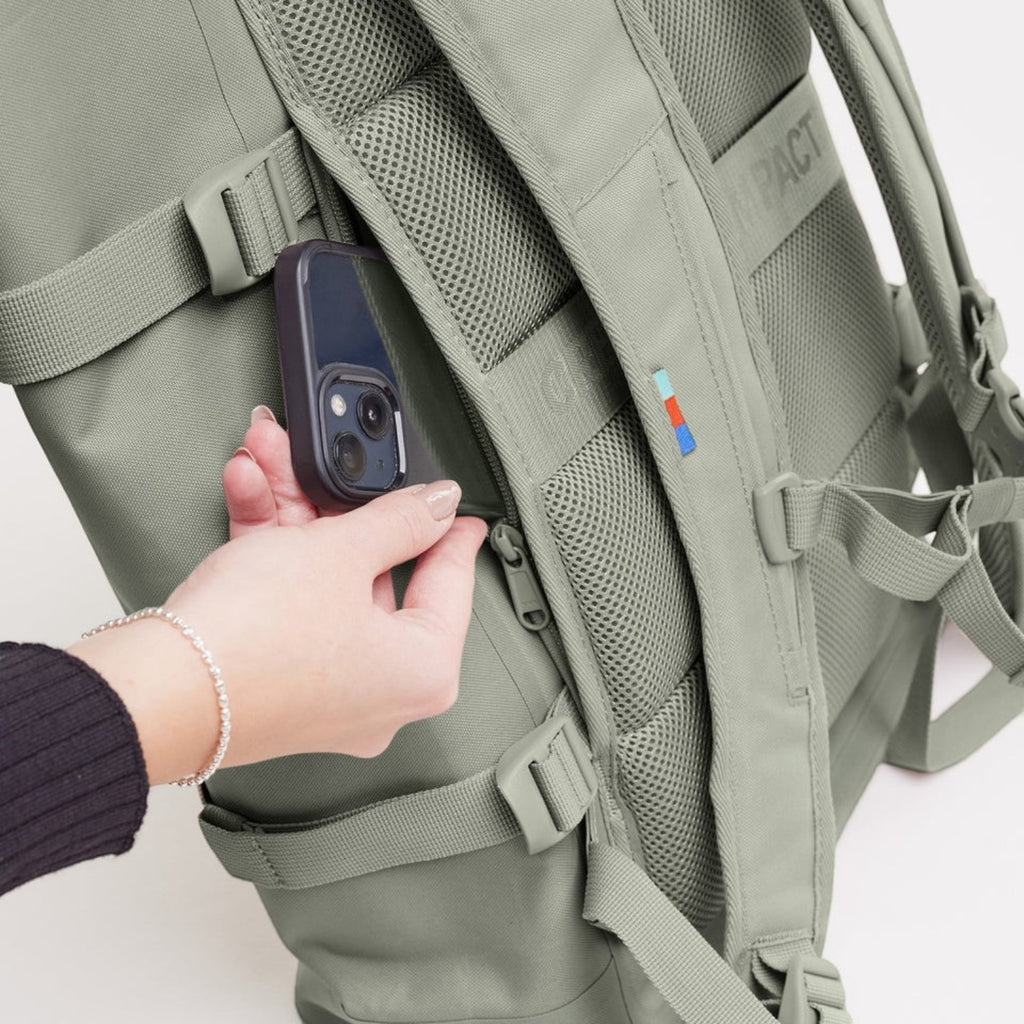Lieblingstasche GOT BAG Rolltop 2.0 backpack in sage green with a hidden zippered back pocket for smartphone storage
