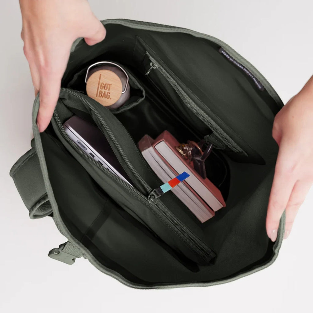 Lieblingstasche GOT BAG Rolltop 2.0 backpack interior showing laptop sleeve, water bottle, and organized compartments.