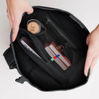 Lieblingstasche GOT BAG Rolltop 2.0 backpack interior showing laptop sleeve, water bottle, and organized compartments.